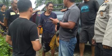 Polisi Gerak Cepat, Selamatkan Warga yang Hanyut di Sungai Pelawi