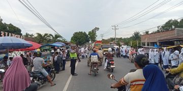 Polres Langkat Hadir di Setiap Pagi: Sat Lantas Kawal Kelancaran Aktivitas Masyarakat dan Pelajar