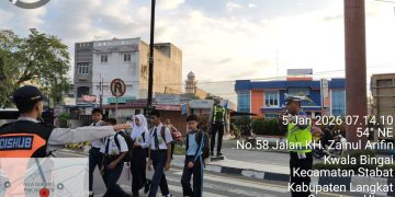 Sat Lantas Polres Langkat Hadir di Pagi Hari, Pastikan Arus Lalu Lintas Aman dan Lancar