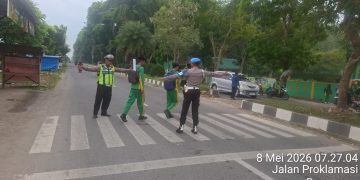 Polisi Hadir di Jalan Raya Sejak Pagi, Sat Lantas Polres Langkat Wujudkan Keamanan dan Kelancaran Aktivitas Masyarakat