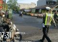 Bantu Penyeberangan Siswa Sekolah dan Urai Kemacetan, Polres Langkat Gelar Strong Point Pagi