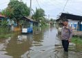Debit Air Naik hingga 50 Sentimeter, Polsek Tanjung Pura Gerak Cepat Pantau Warga Terdampak Banjir